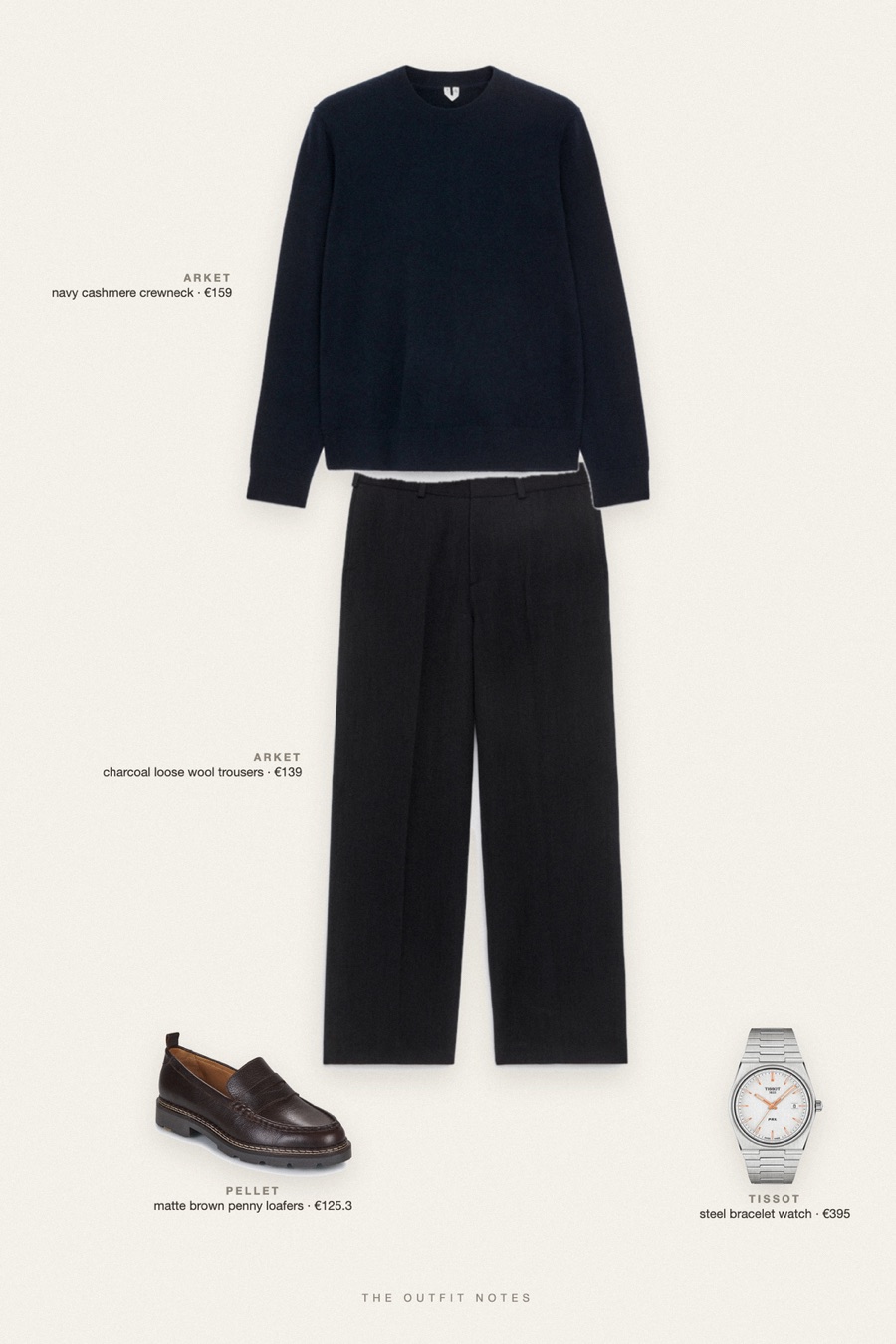 Flat-lay of the pieces in this outfit: navy cashmere crewneck, charcoal loose wool trousers, matte brown penny loafers, steel bracelet watch.